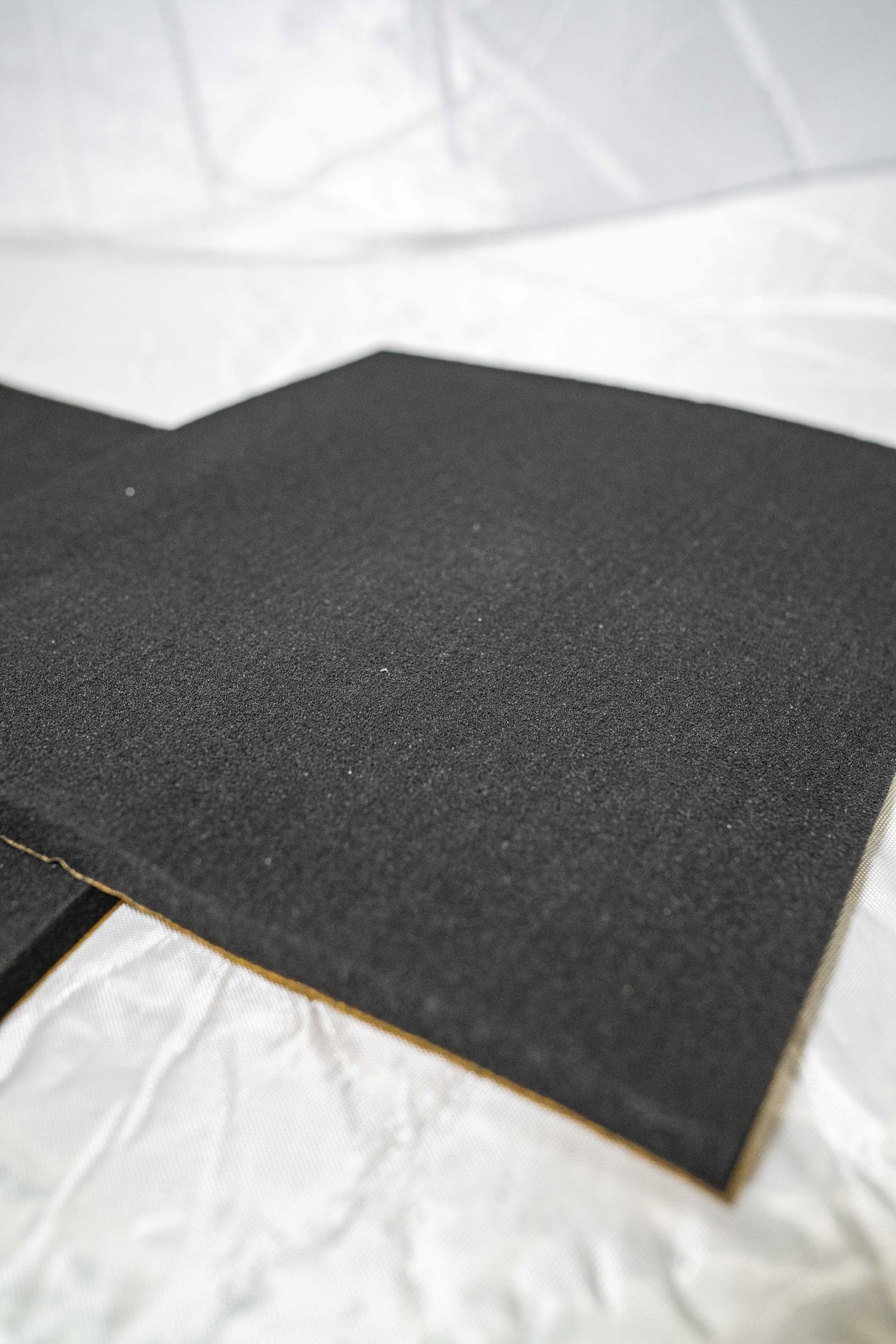 15mm flat foam fireproof soundproofing material, made in the UK to our specifications. Close up view.